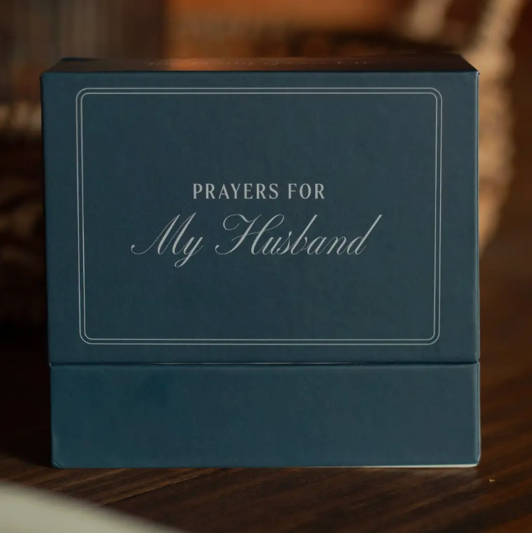 Blue box of prayer cards titled 'Prayers for My Husband' on a wooden surface